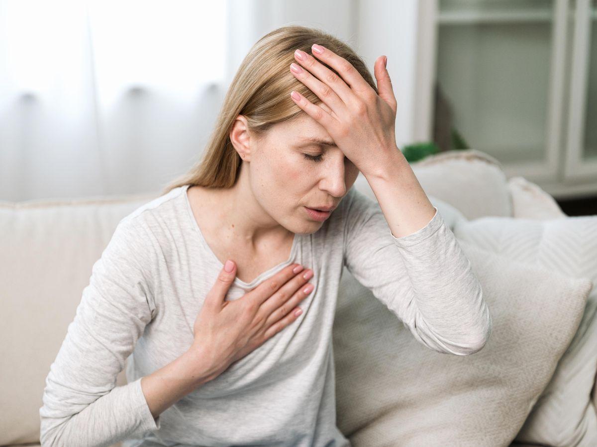 Woman noticing anxiety symptoms