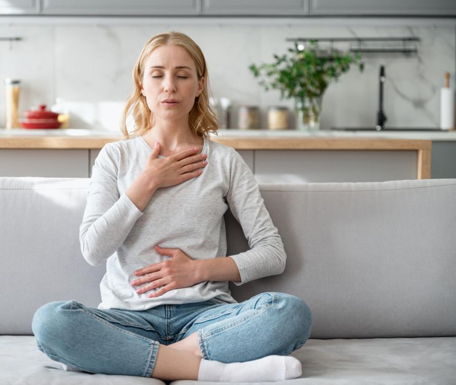 Woman using breathing techniques