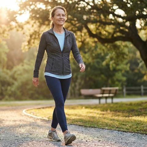 Woman walking outdoors for exercise
